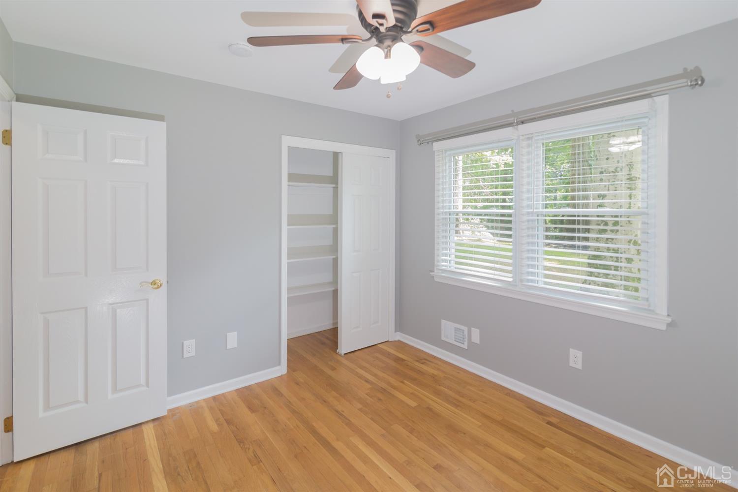 6 Coventry Square Holmdel, NJ 07733 - Photo 19 of 36 a view of an empty room with a window