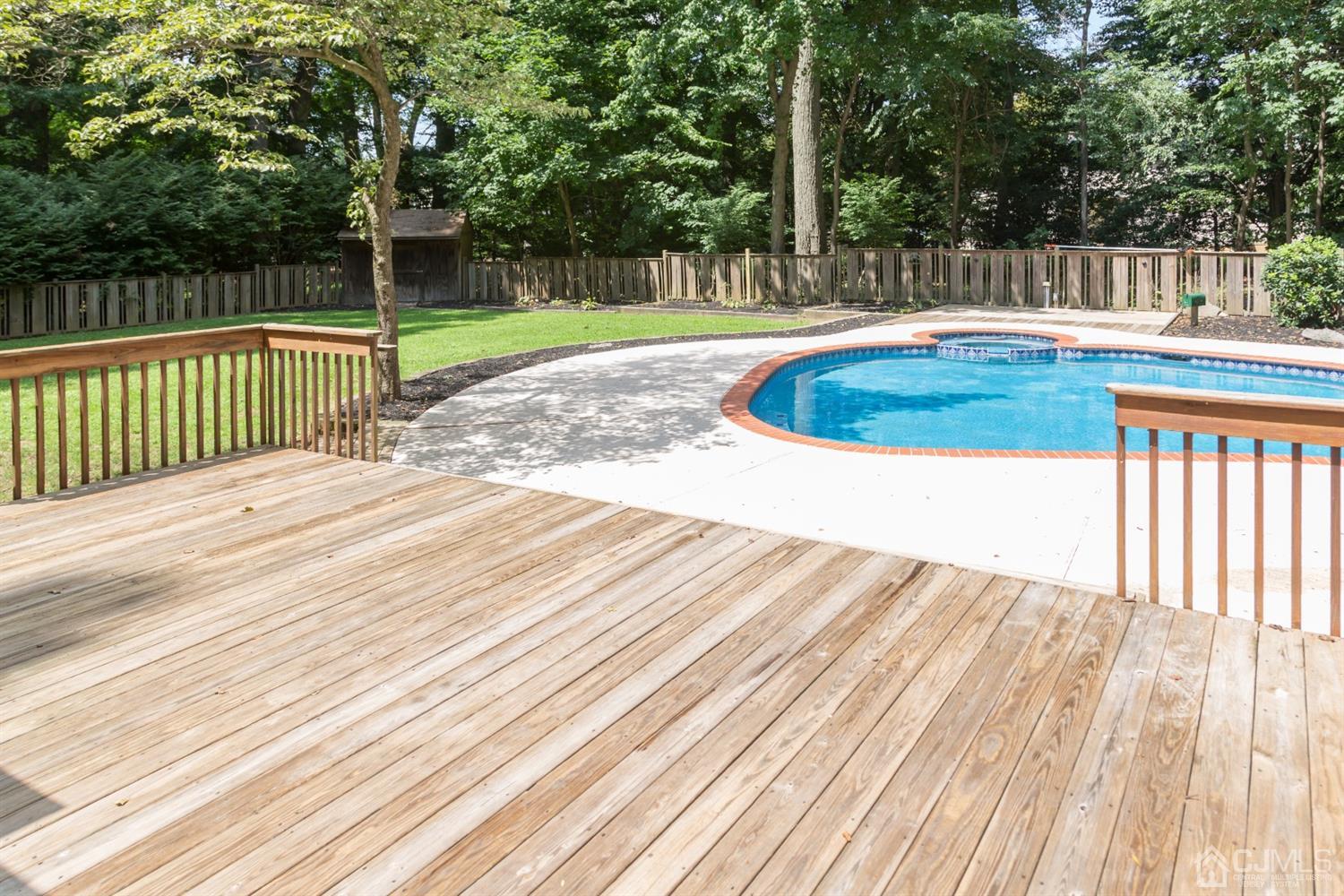 6 Coventry Square Holmdel, NJ 07733 - Photo 34 of 36 a swimming pool view