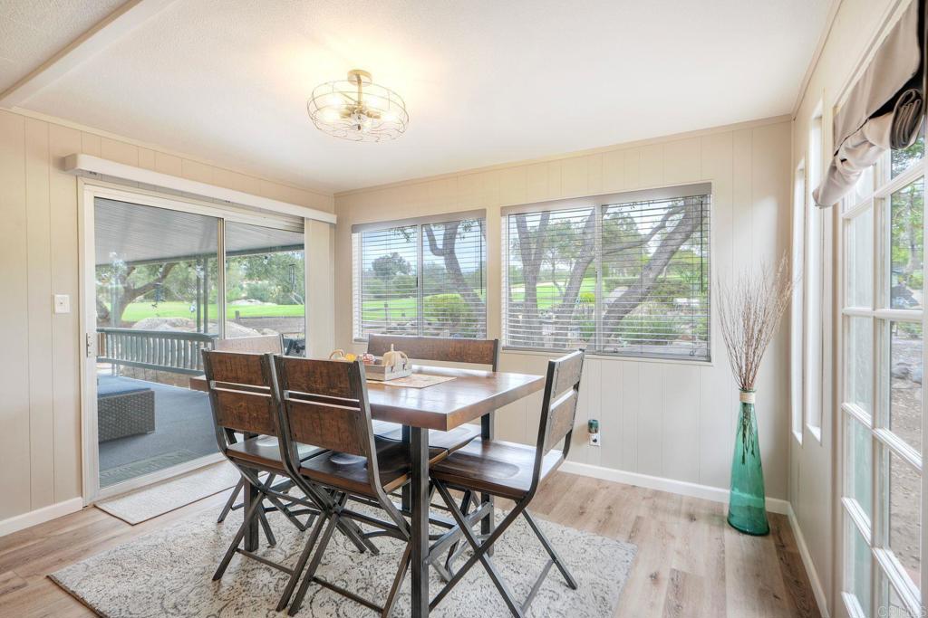 18218 Paradise Mountain Road Valley Center, CA 92082 - Photo 14 of 42 a view of a dining room with furniture window and outside view