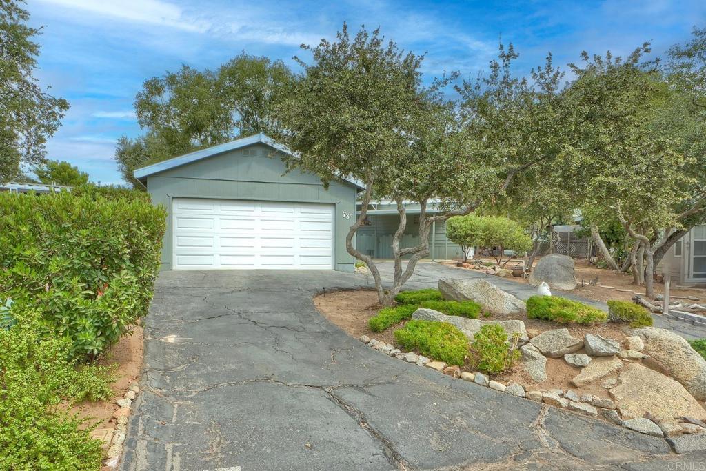 18218 Paradise Mountain Road Valley Center, CA 92082 - Photo 39 of 42 a house with trees in the background