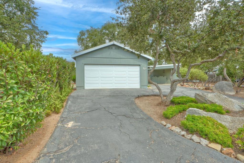 18218 Paradise Mountain Road Valley Center, CA 92082 - Photo 40 of 42 a house with trees in the background
