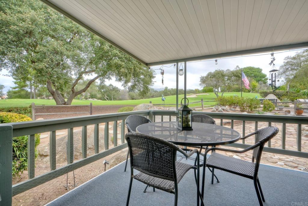 18218 Paradise Mountain Road Valley Center, CA 92082 - Photo 4 of 42 a view of a patio with furniture and backyard