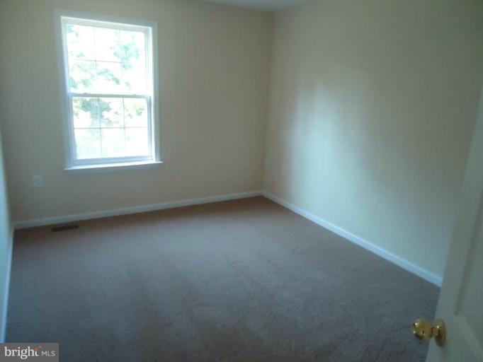 146 Ranson Estates Circle Ranson, WV 25438 - Photo 3 of 12 an empty room with a window