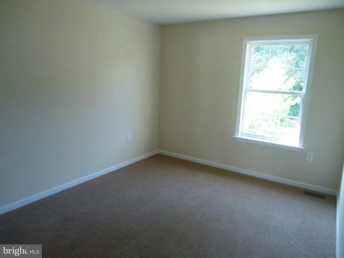146 Ranson Estates Circle Ranson, WV 25438 - Photo 4 of 12 an empty room with a window