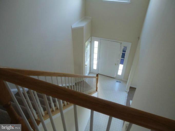 146 Ranson Estates Circle Ranson, WV 25438 - Photo 5 of 12 a view of staircase with railing and a window