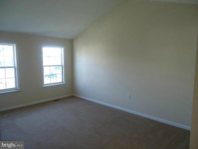 146 Ranson Estates Circle Ranson, WV 25438 - Photo 6 of 12 an empty room with a window