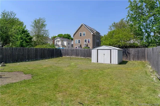 a house with trees in the background