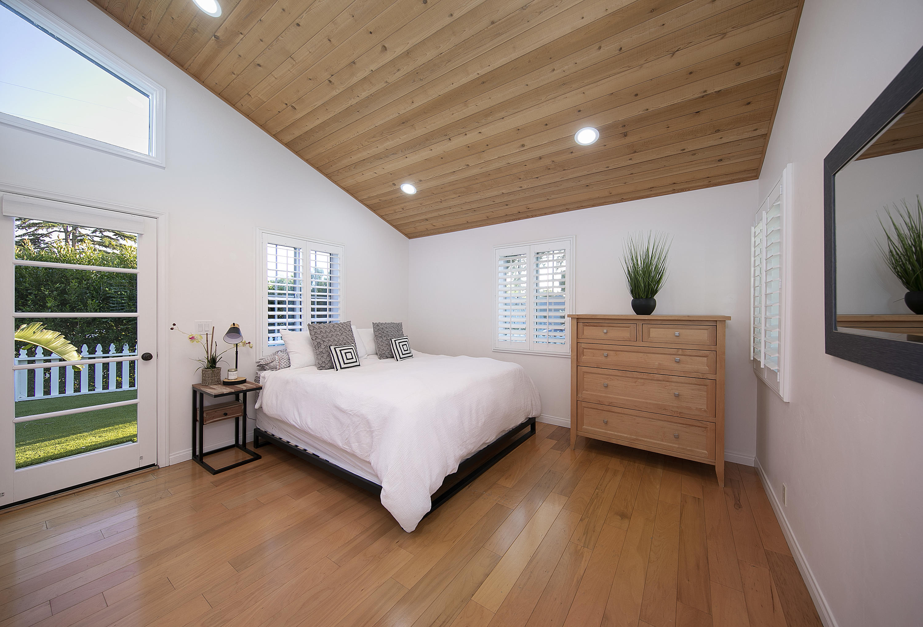 330 Mohawk Road Santa Barbara, CA 93109 - Photo 12 of 16 a spacious bedroom with a bed and a window