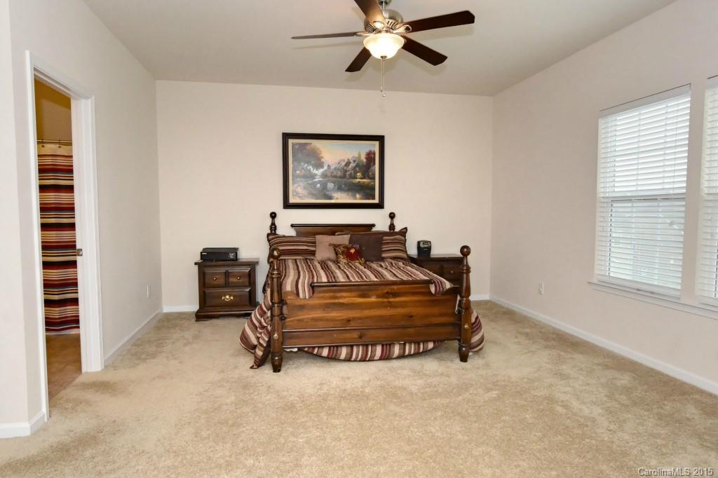 1621 Ridgehaven Road, Unit 240 Waxhaw, NC 28173 - Photo 19 of 24 a bedroom with a bed and a window