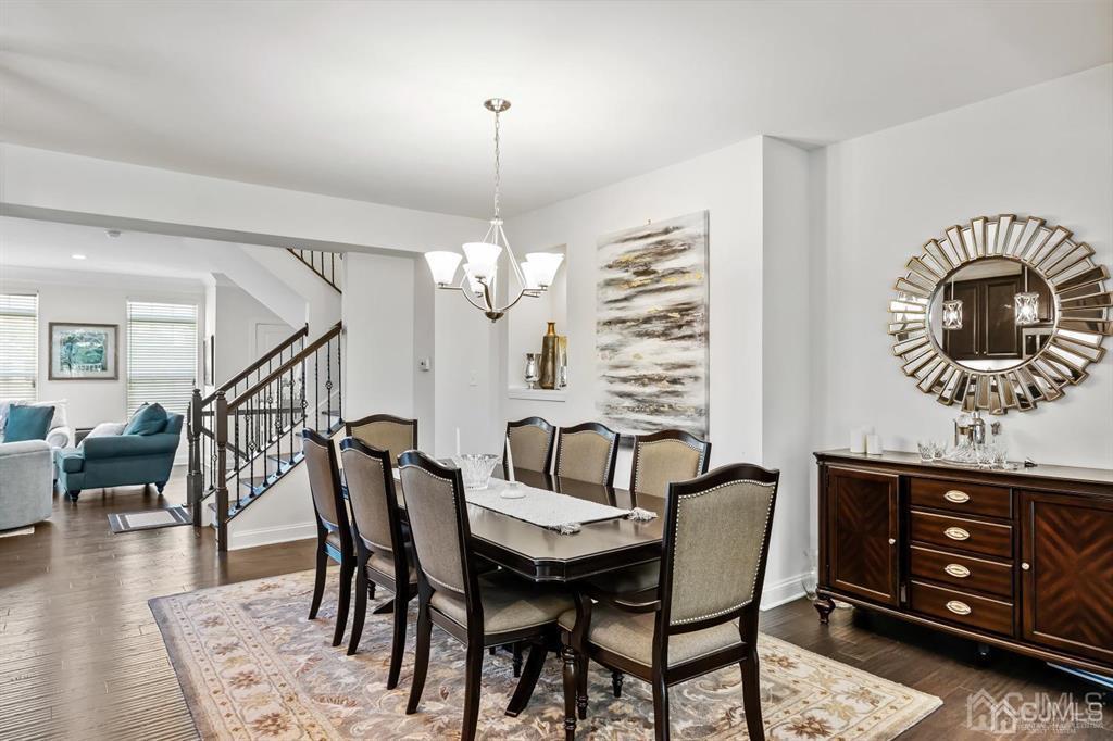 55 Isabelle Court Evesham, NJ 08053 - Photo 11 of 37 a view of a dining room with furniture and wooden floor