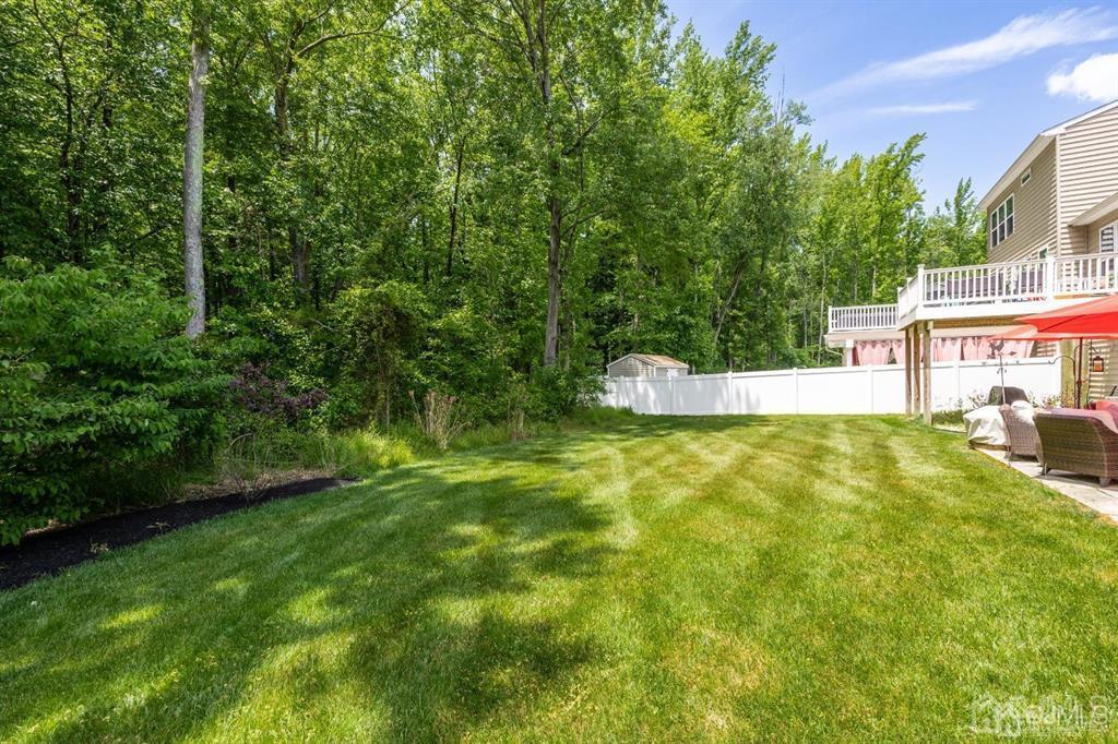 55 Isabelle Court Evesham, NJ 08053 - Photo 36 of 37 a view of a house with pool and garden