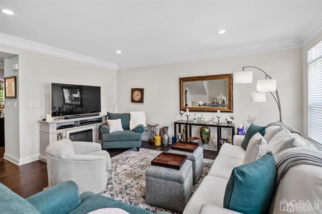 55 Isabelle Court Evesham, NJ 08053 - Photo 8 of 37 a living room with furniture and a flat screen tv