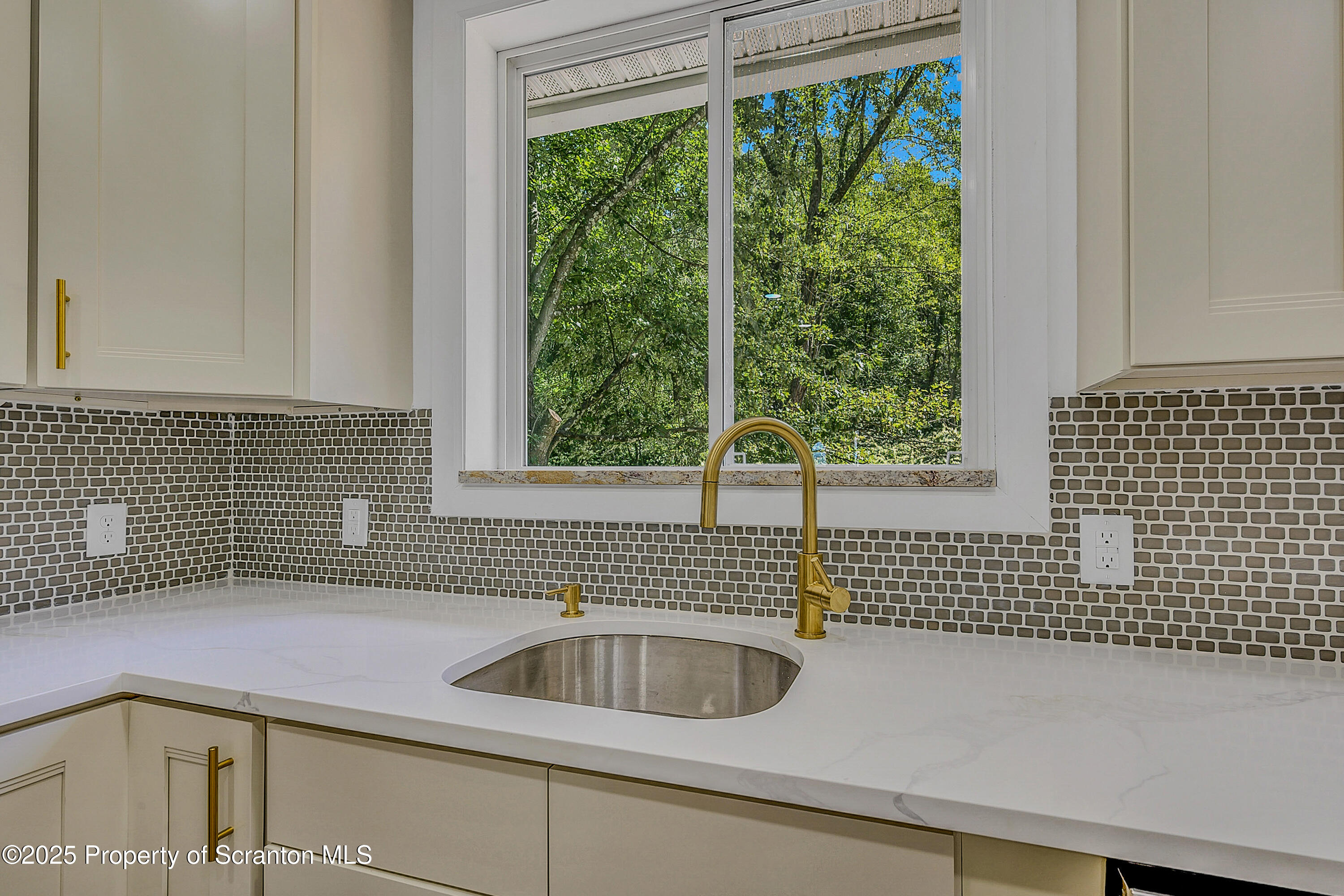 218 East Main Street Susquehanna, PA 18847 - Photo 22 of 43 a view of a sink and a window