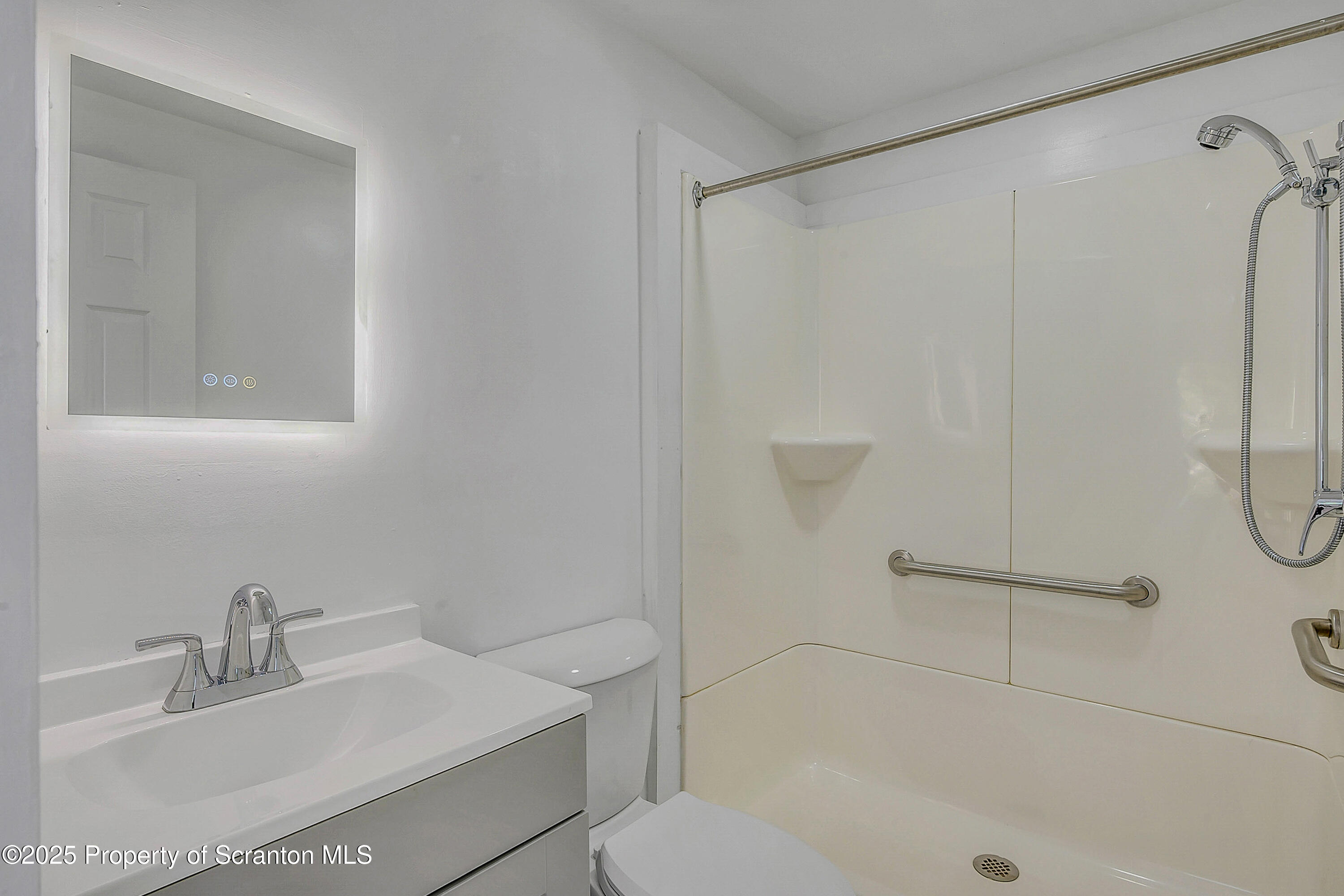 218 East Main Street Susquehanna, PA 18847 - Photo 24 of 43 a bathroom with a sink toilet and shower