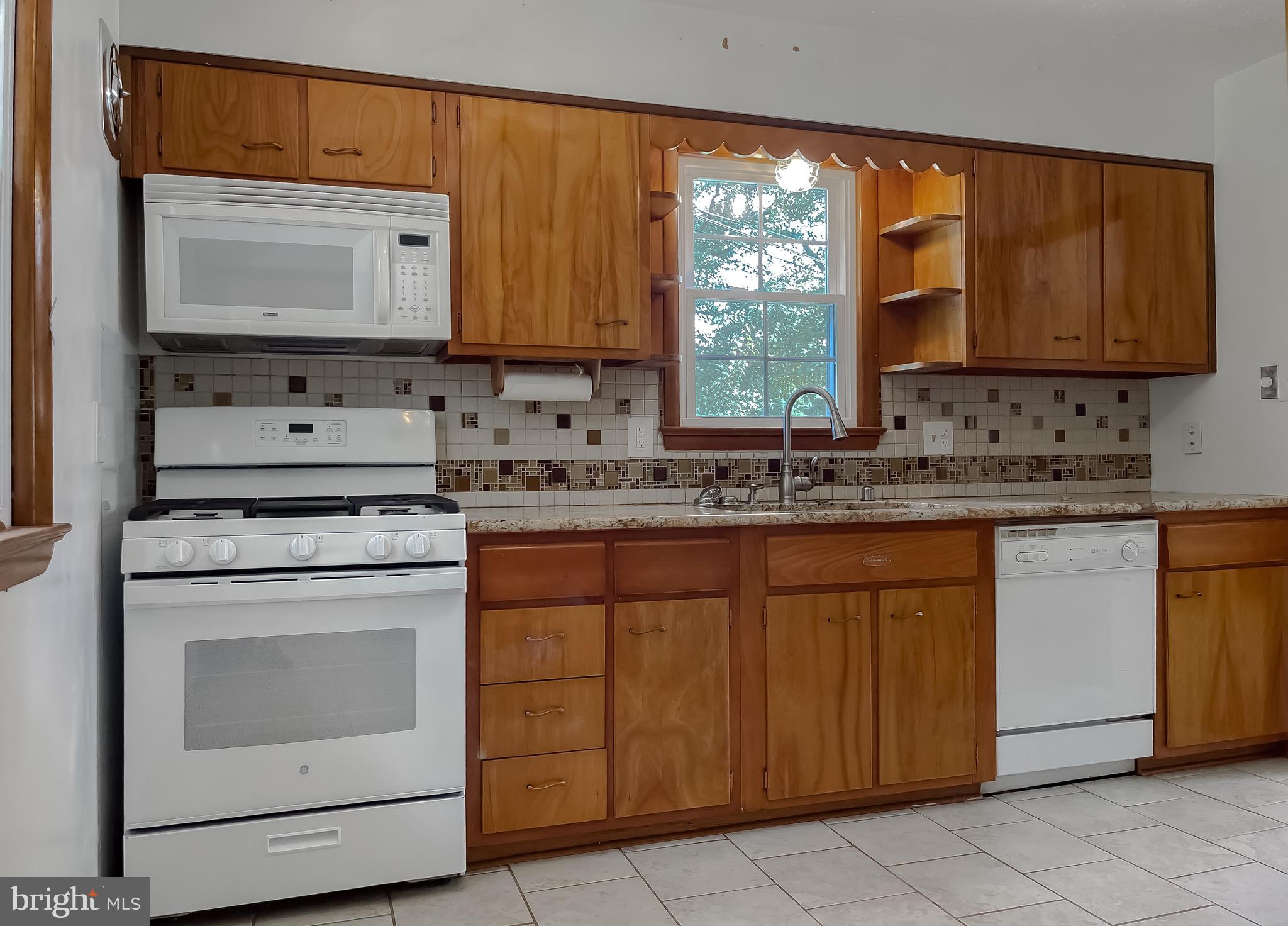 15805 Menk Road Accokeek, MD 20607 - Photo 11 of 56 Kitchen with gas stove, granite countertops