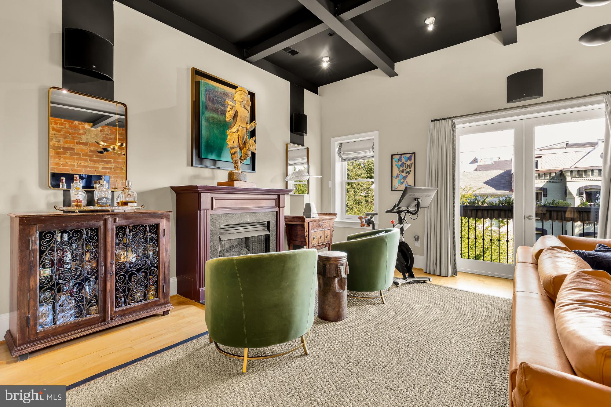 1220 N Street Northwest, Unit 4B Washington, DC 20005 - Photo 2 of 25 a living room with furniture and a large window