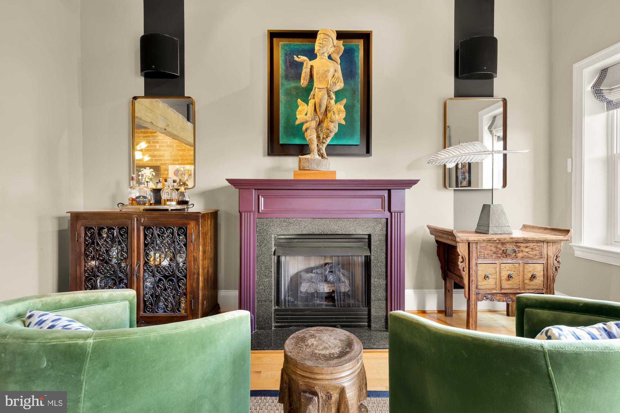 1220 N Street Northwest, Unit 4B Washington, DC 20005 - Photo 3 of 25 a living room with furniture a fireplace and a window