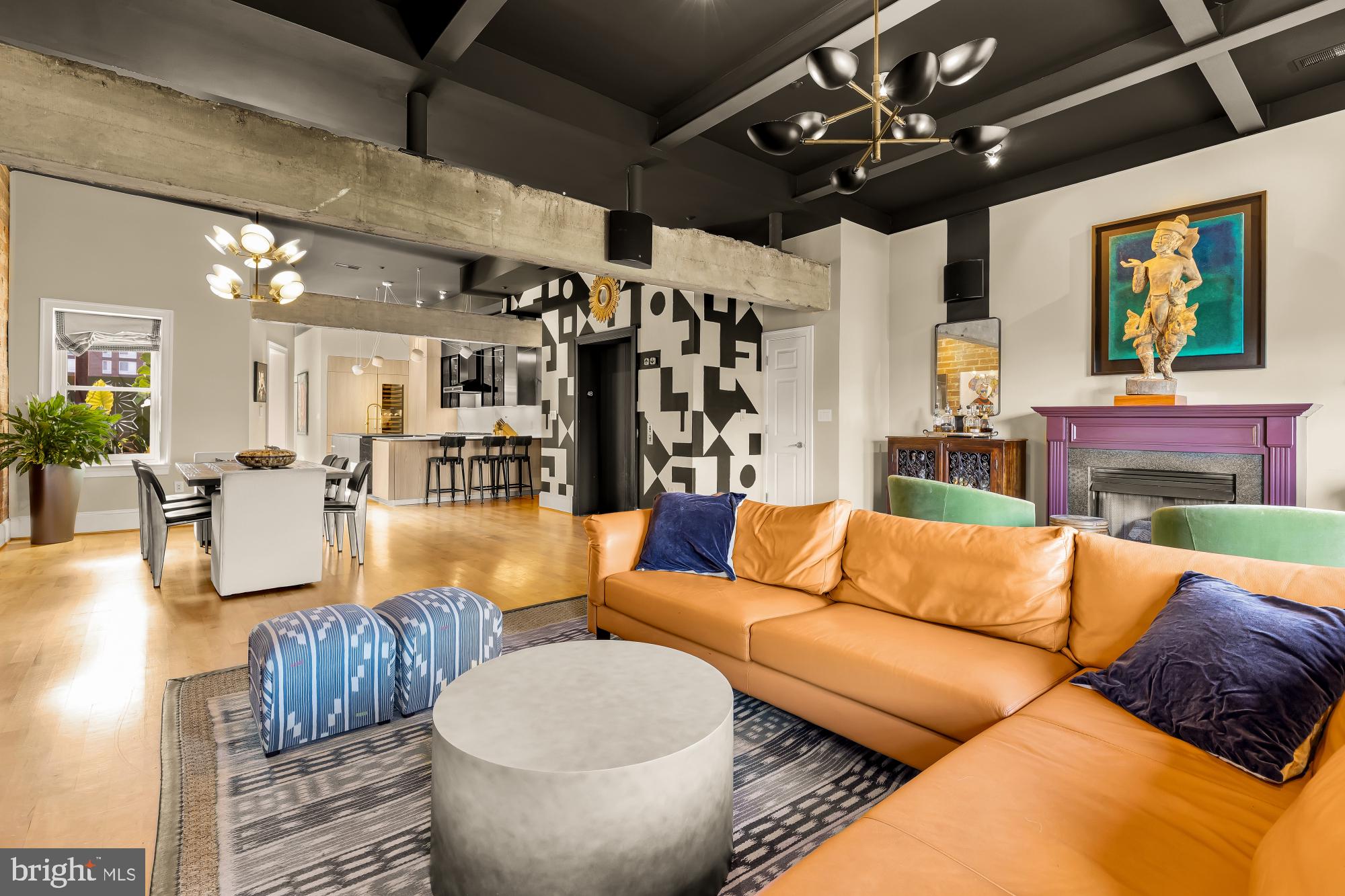 1220 N Street Northwest, Unit 4B Washington, DC 20005 - Photo 6 of 25 a living room with furniture and wooden floor