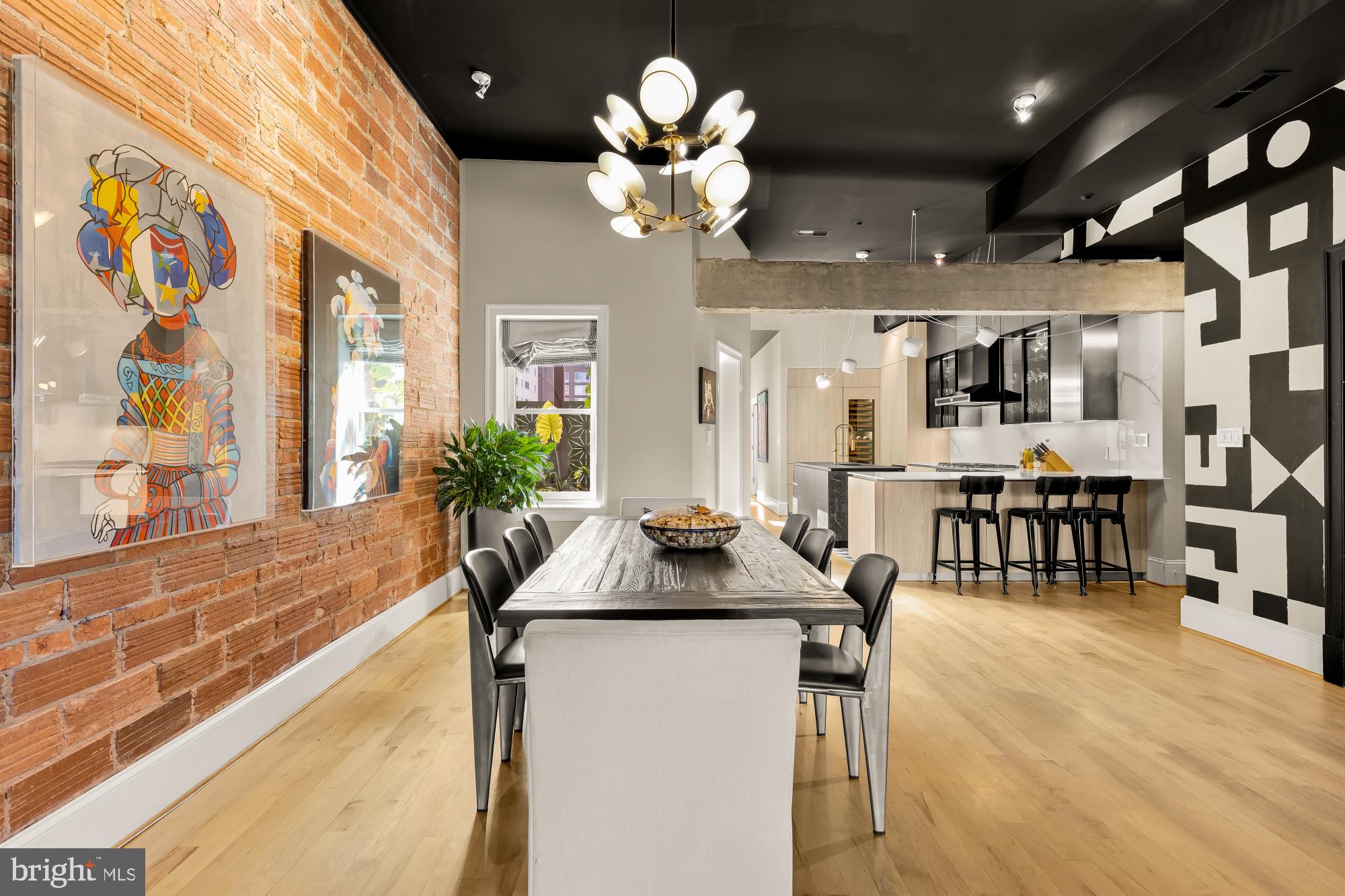 1220 N Street Northwest, Unit 4B Washington, DC 20005 - Photo 8 of 25 a kitchen with a counter space a sink and cabinets