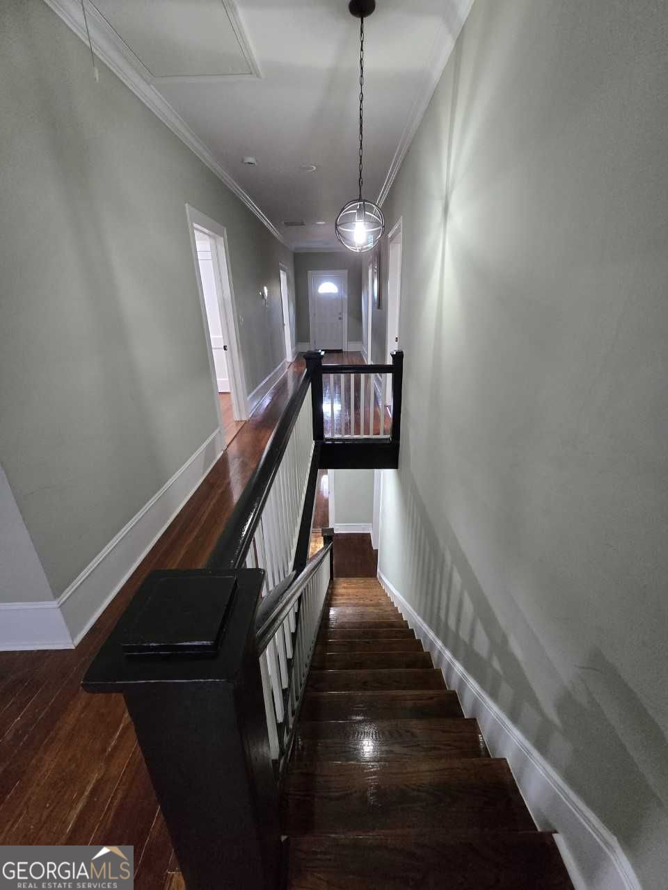 402 Meriwether Street Griffin, GA 30224 - Photo 14 of 36 a view of entryway and hall with wooden floor