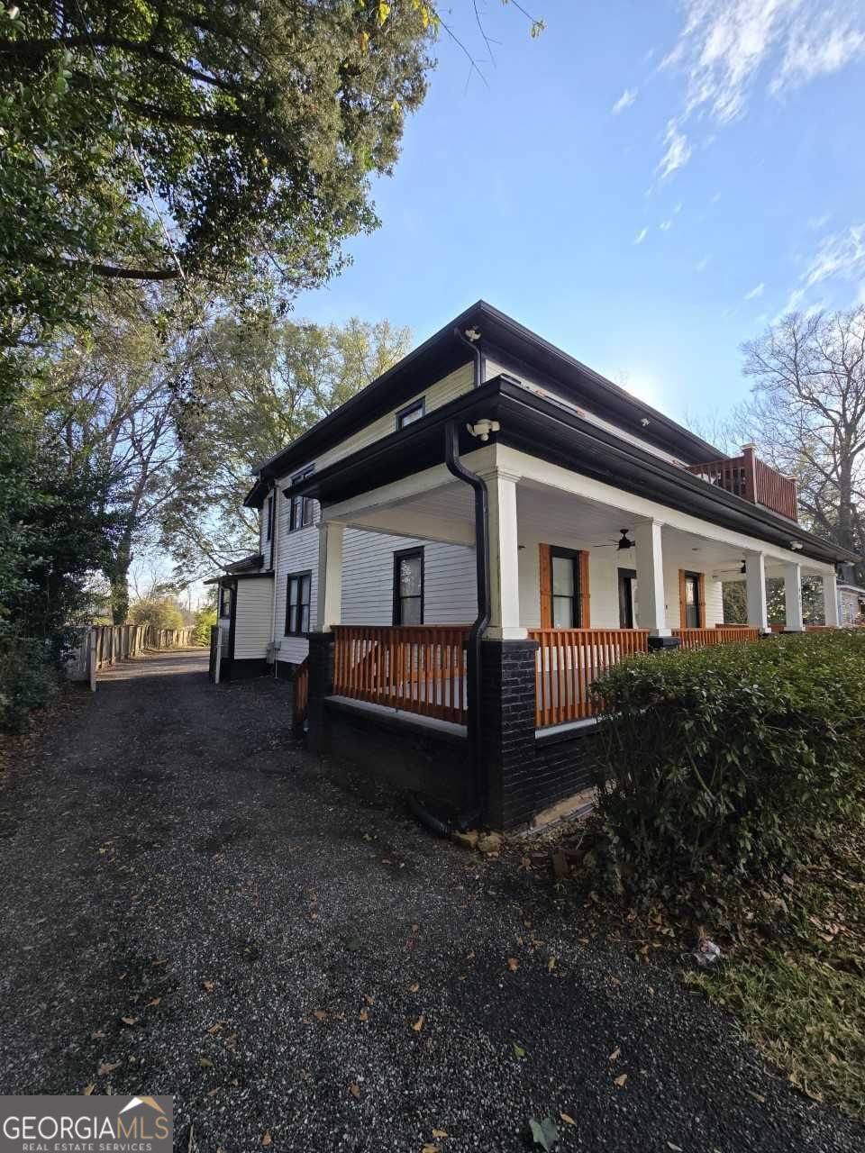 402 Meriwether Street Griffin, GA 30224 - Photo 2 of 36 a house that has a lot of plants in it