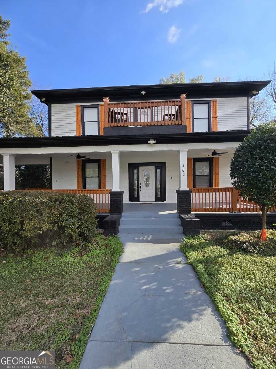 402 Meriwether Street Griffin, GA 30224 - Photo 4 of 36 a view of a house with a yard