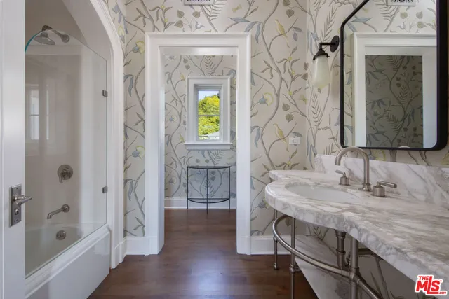 a house view with a sitting space and garden view