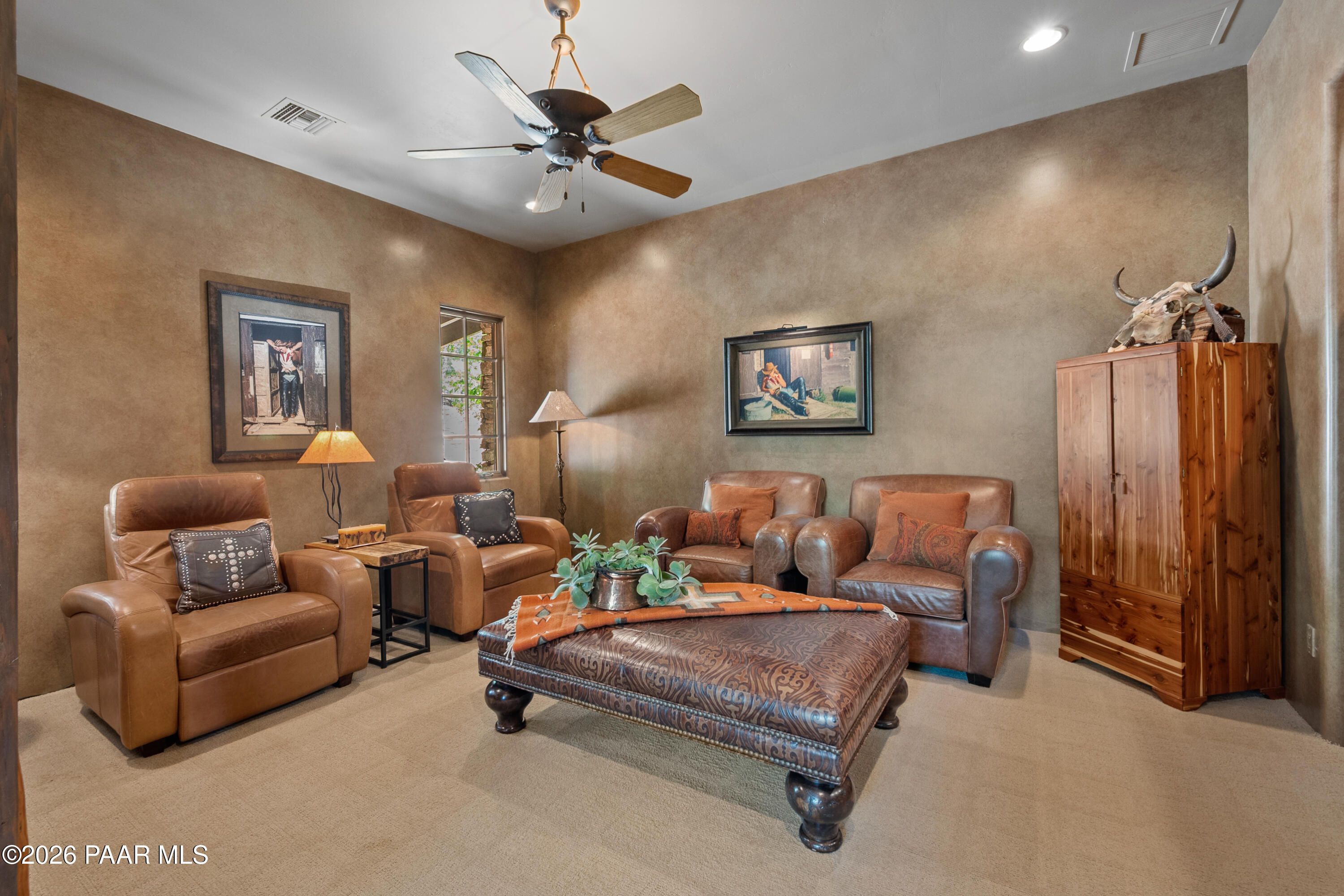 1515 High Valley Ranch Road Prescott, AZ 86303 - Photo 35 of 76 a living room with furniture and a chandelier