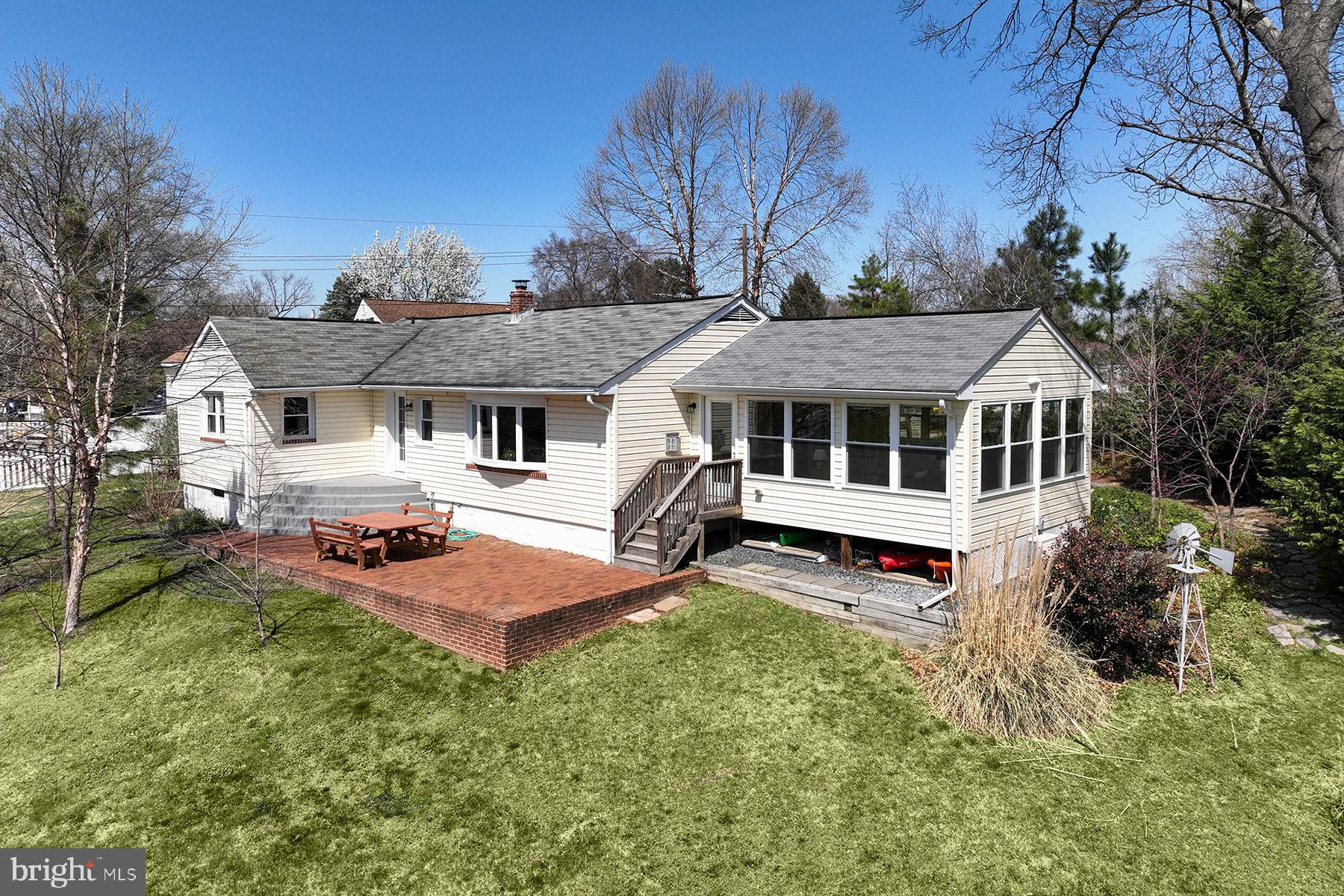 101 Norman Road Pasadena, MD 21122 - Photo 3 of 23 Spacious patio and fabulous sunroom