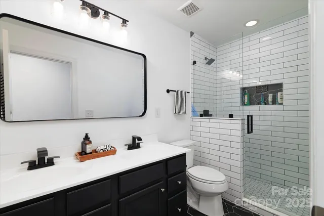 a work room with furniture and window