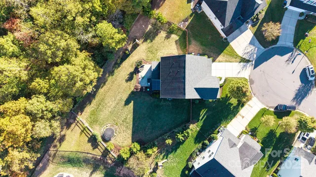 an aerial view of a swimming pool