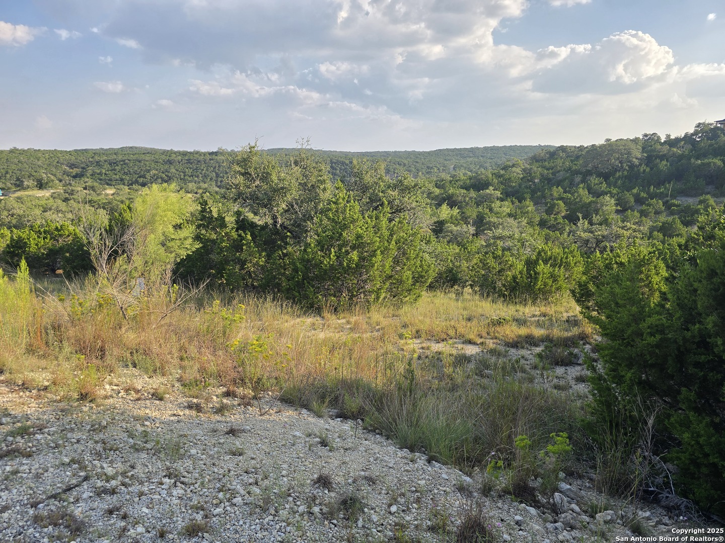 479 Canyon Rim Helotes, TX 78023 - Photo 14 of 40 a view of lake with mountain