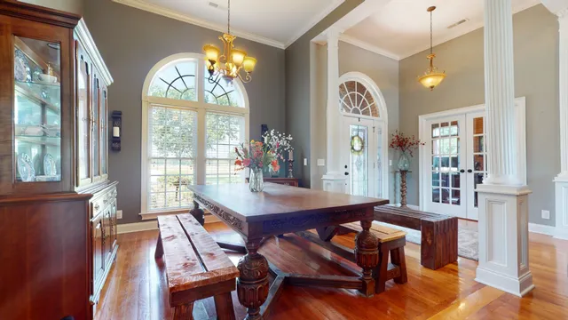 a living room with fireplace furniture and a flat screen tv