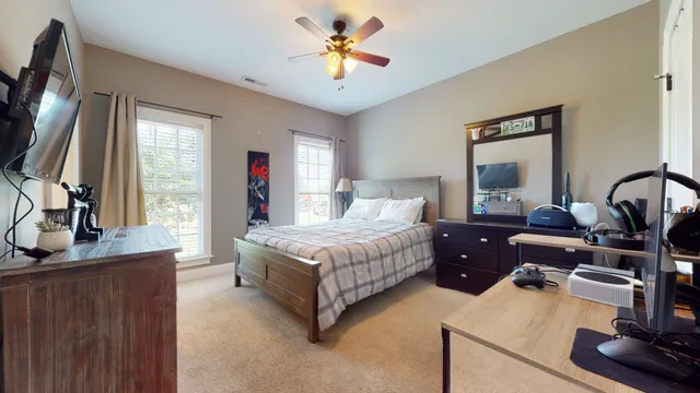 a view of a lake with a building in the background