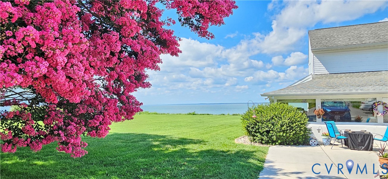 617 Sheepside Road Laneview, VA 22504 - Photo 6 of 9 Expansive green lawn extending to a body of water,