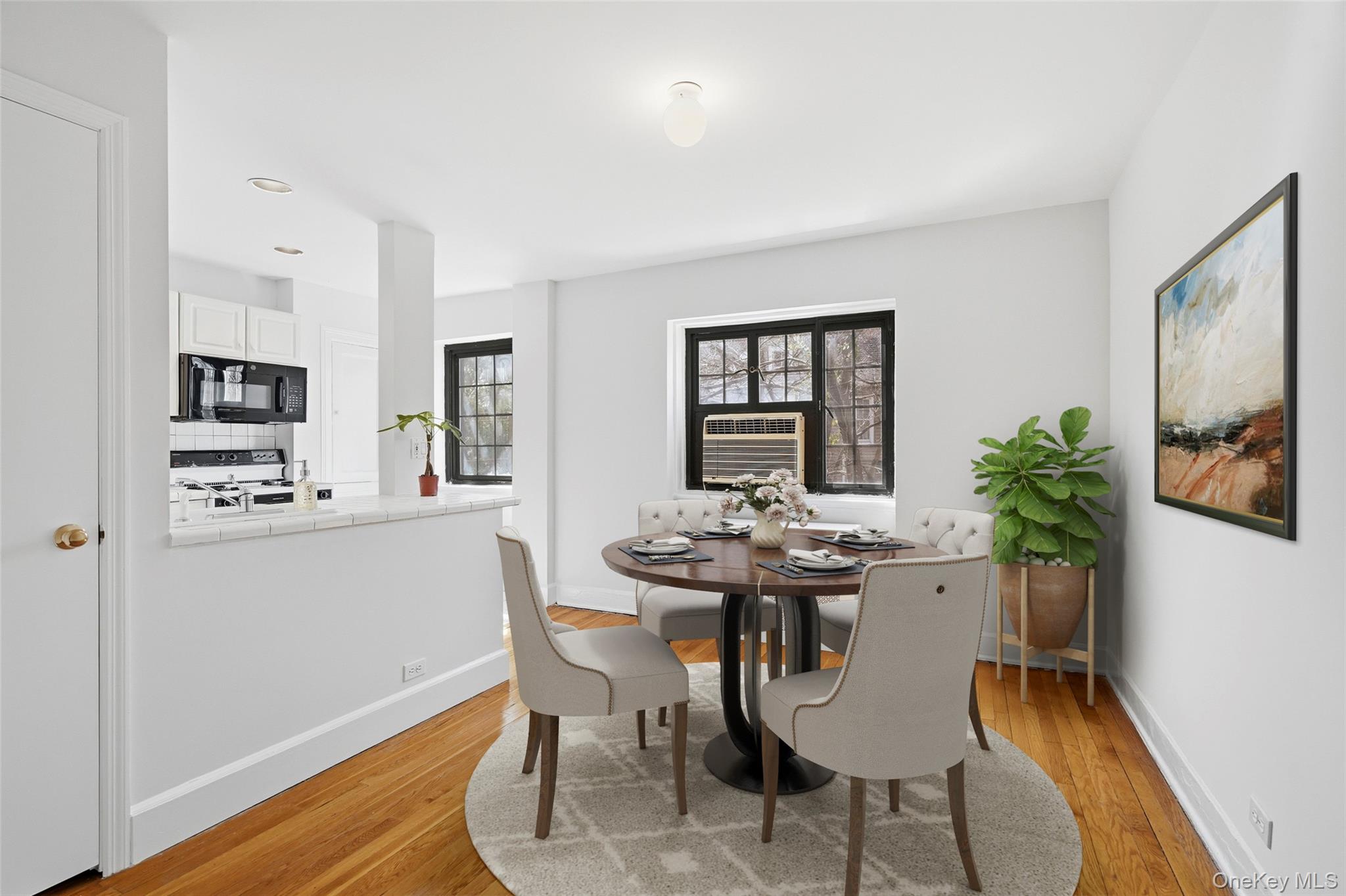 6 Davis Avenue, Unit C22 Rye, NY 10580 - Photo 4 of 20 Virtually staged--dining area/flex space in kitchen
