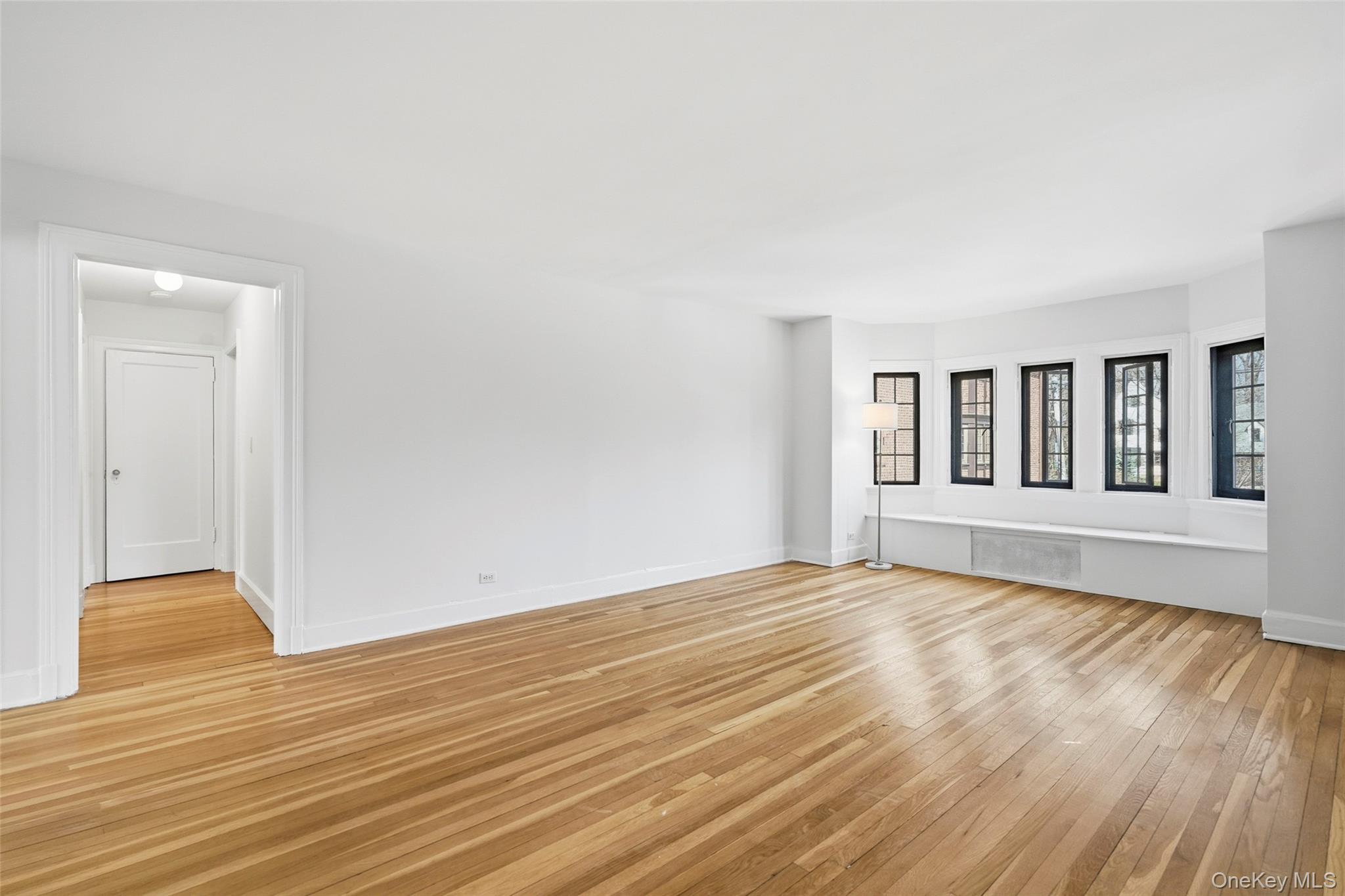 6 Davis Avenue, Unit C22 Rye, NY 10580 - Photo 9 of 20 Living Room with hallway to 2 bedrooms and 2 baths