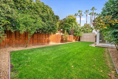 a view of a backyard with a garden