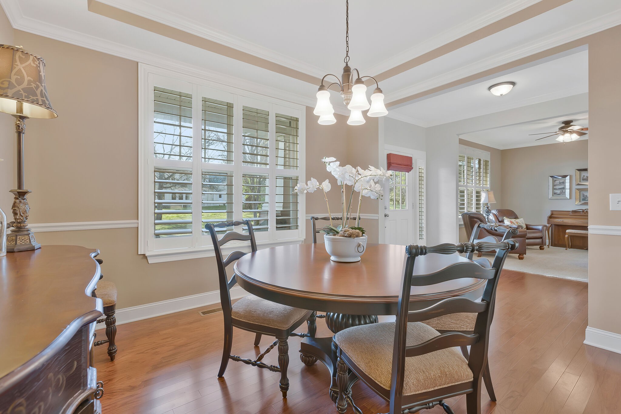 119 Verde Meadow Drive Franklin, TN 37067 - Photo 11 of 35 a view of a dining room with furniture window and wooden floor