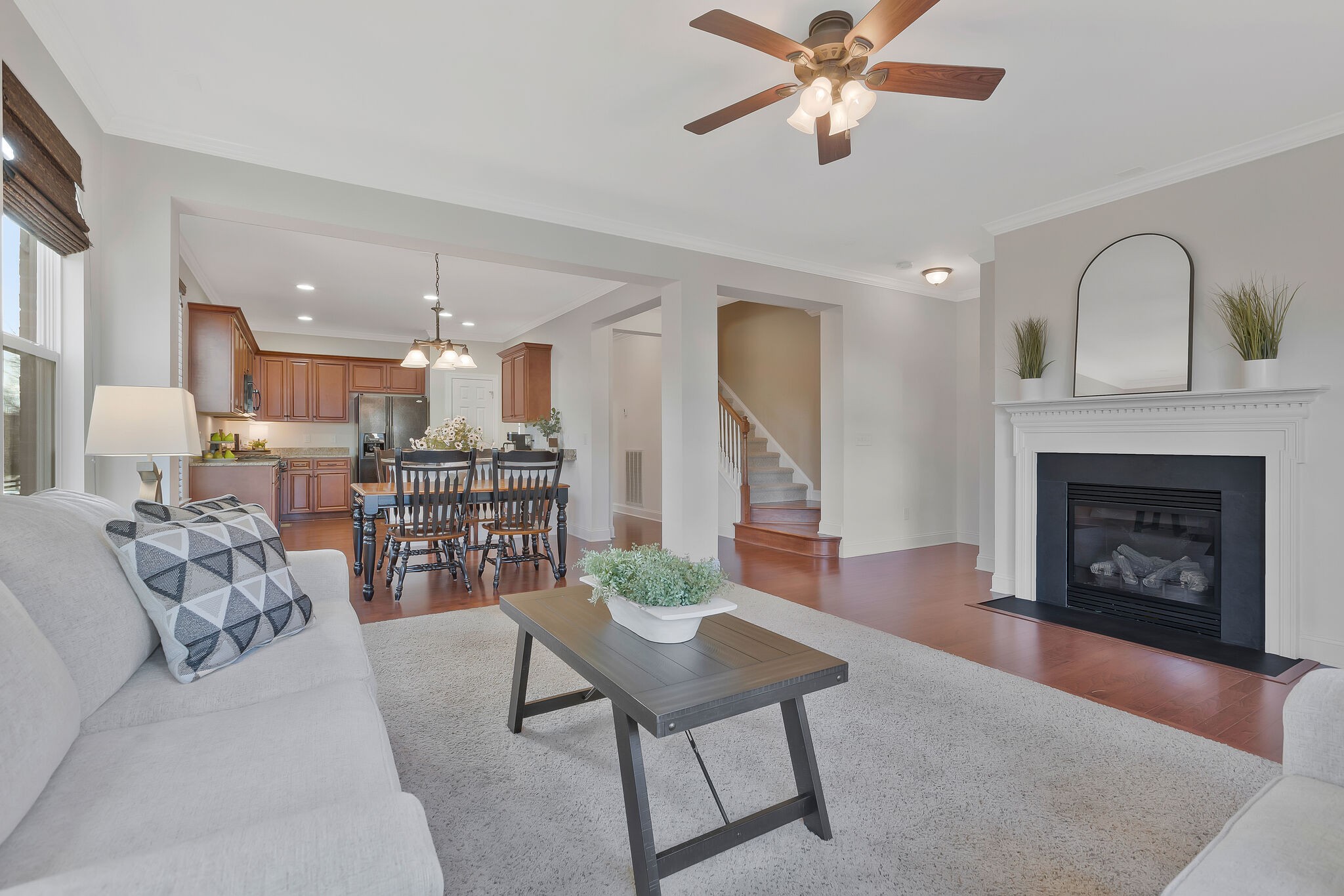 119 Verde Meadow Drive Franklin, TN 37067 - Photo 14 of 35 a living room with furniture and a fireplace