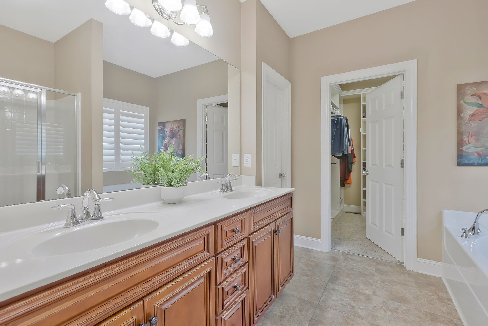 119 Verde Meadow Drive Franklin, TN 37067 - Photo 17 of 35 a bathroom with a sink double vanity and a mirror