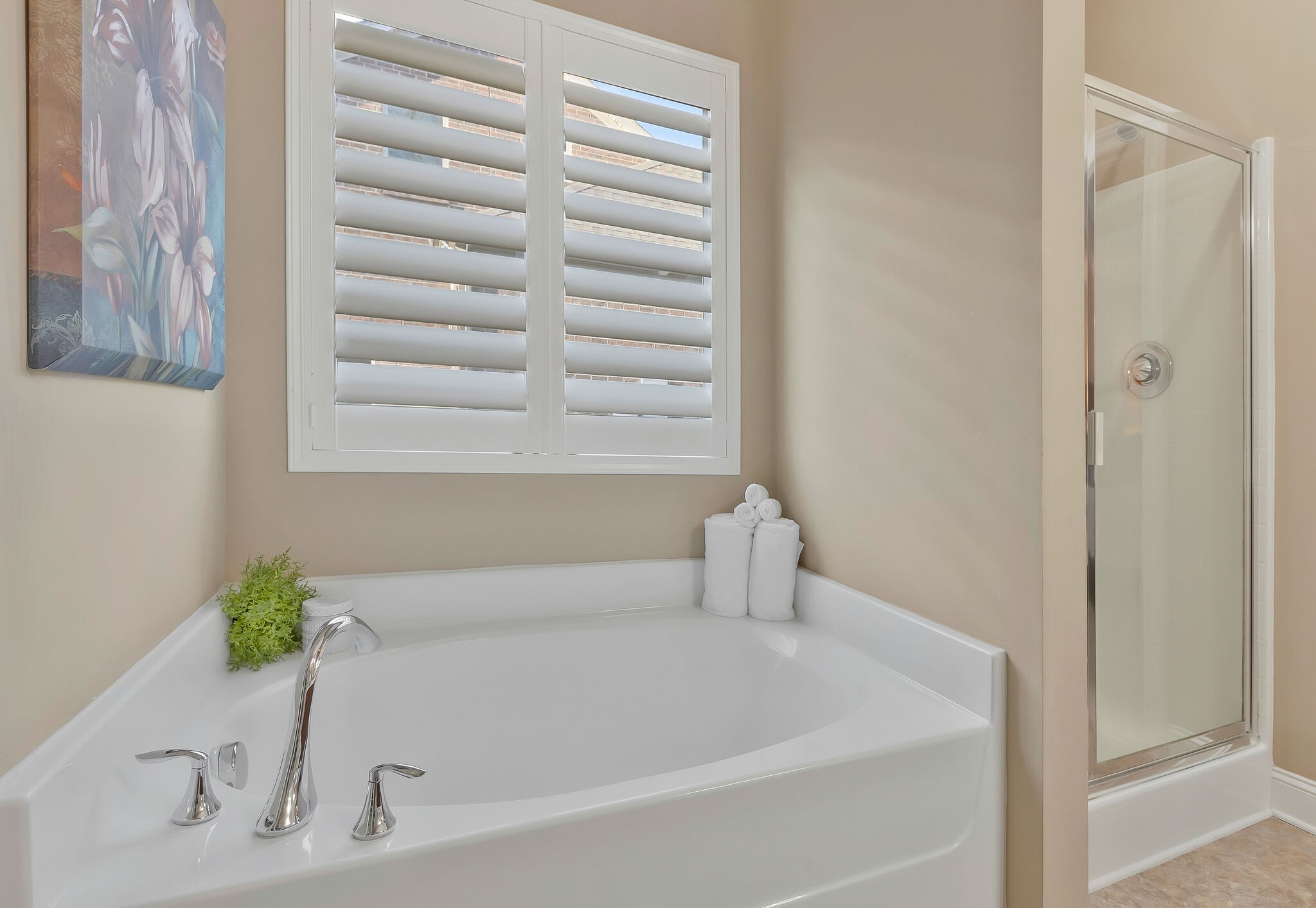 119 Verde Meadow Drive Franklin, TN 37067 - Photo 18 of 35 a white bath tub sitting in a bathroom next to a window