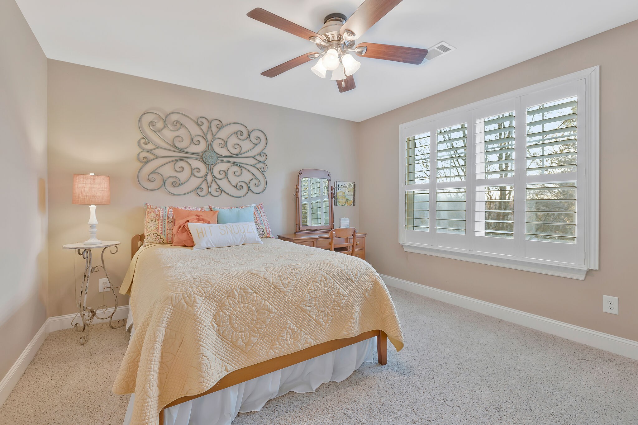 119 Verde Meadow Drive Franklin, TN 37067 - Photo 22 of 35 a bedroom with a large bed and a chandelier