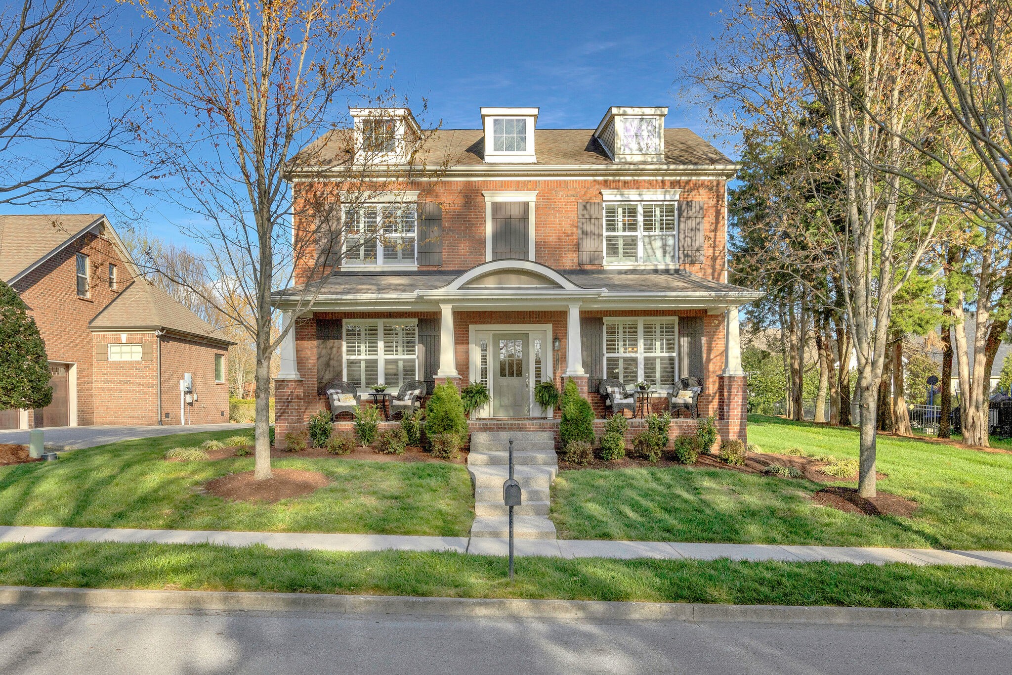 119 Verde Meadow Drive Franklin, TN 37067 - Photo 35 of 35 a front view of a residential apartment building with a yard