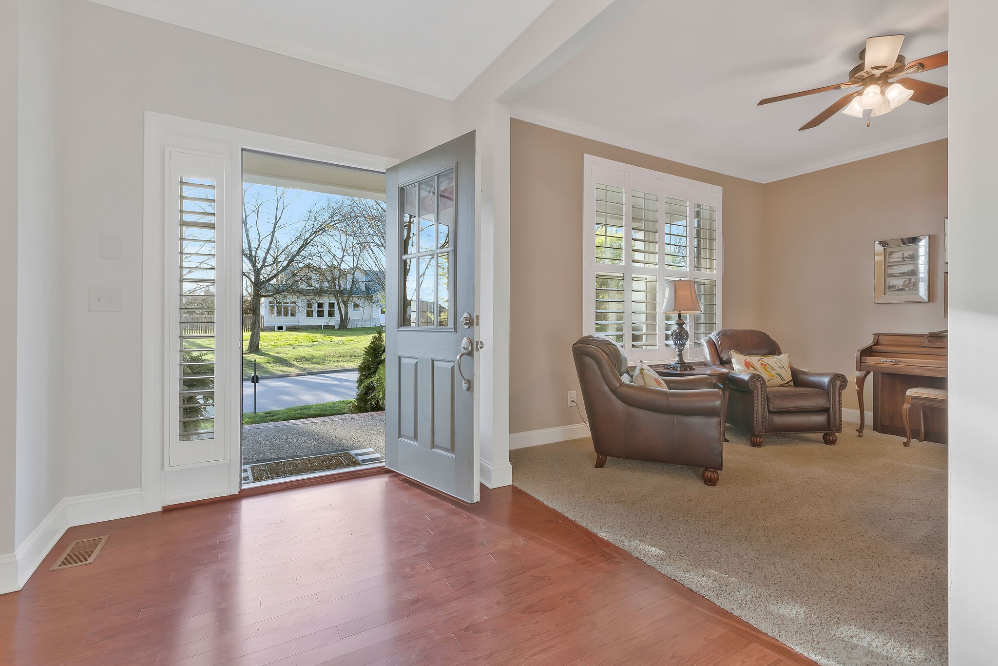 119 Verde Meadow Drive Franklin, TN 37067 - Photo 7 of 35 a living room with furniture and a floor to ceiling window