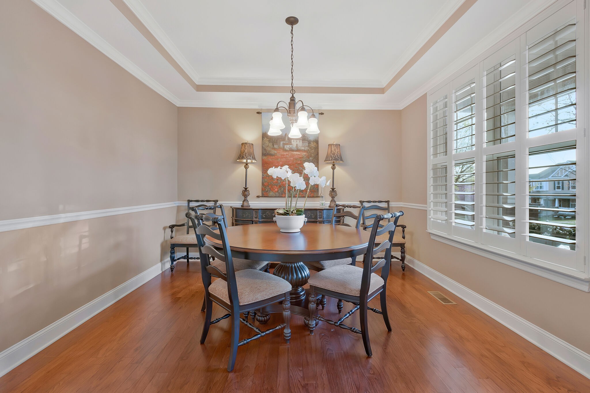 119 Verde Meadow Drive Franklin, TN 37067 - Photo 10 of 35 a dining room with furniture a chandelier and wooden floor