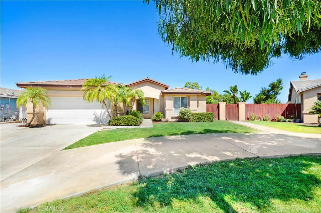 5935 Simon Court Riverside, CA 92504 - Photo 1 of 1 a front view of a house with garden