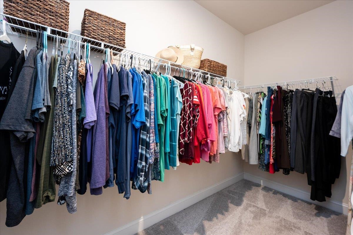 7108 Rex Road Holly Springs, NC 27540 - Photo 29 of 38 This walk-in closet is huge and what you see is only half of it! Walk-in Closet