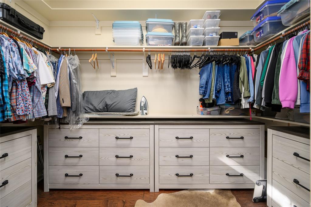 588 Lakepoint Loop Pottsboro, TX 75076 - Photo 23 of 39 a view of a closet with storage