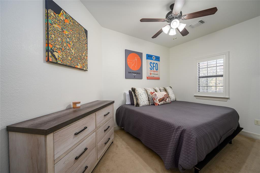 588 Lakepoint Loop Pottsboro, TX 75076 - Photo 29 of 39 a bedroom with a bed and a window